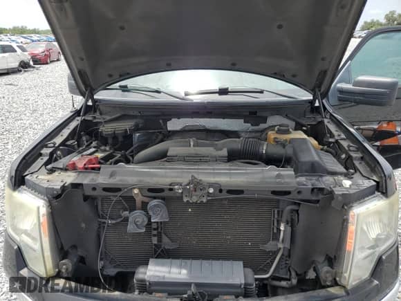 2013 Ford F-150 XL with VIN 1FTFX1CT1DFA93504, listed as a Copart auction lot 59713015 with 128,824 mi miles and Salvage title. Bid and sale history available at DreamBid. Image 11.