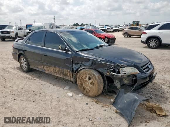 2002 Honda Accord SE с VIN JHMCG56762C007058, выставлен на аукционе Copart как лот 64397665 с пробегом 194 543 миль миль и Списание • Salvage title. История ставок и продаж доступна на DreamBid. Изображение 4.