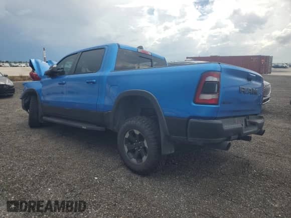 2020 Ram 1500 Rebel z VIN 1C6SRFLT4LN317415, wystawiony jako Copart lot #67455185 z przebiegiem 58 773 mil mil oraz Nie do naprawy • Non repairable. Historia ofert i sprzedaży dostępna na DreamBid. Obrazek 2.