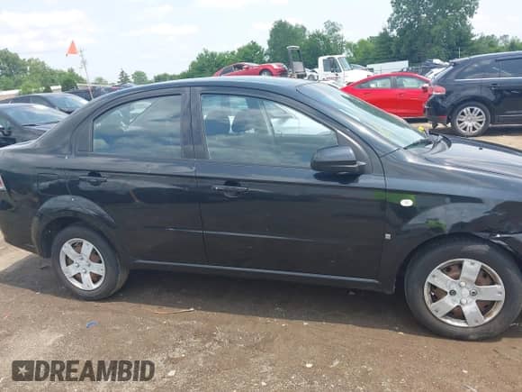 2007 Chevrolet Aveo LS with VIN KL1TD56627B055436, listed as a IAAI auction lot 42462092 with 102,923 mi miles and . Bid and sale history available at DreamBid. Image 13.