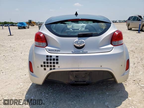 2013 Hyundai Veloster w/Black Int z VIN KMHTC6AD9DU147646, wystawiony jako Copart lot #58495585 z przebiegiem 121 781 mil mil oraz Szkoda całkowita • Salvage title. Historia ofert i sprzedaży dostępna na DreamBid. Obrazek 6.