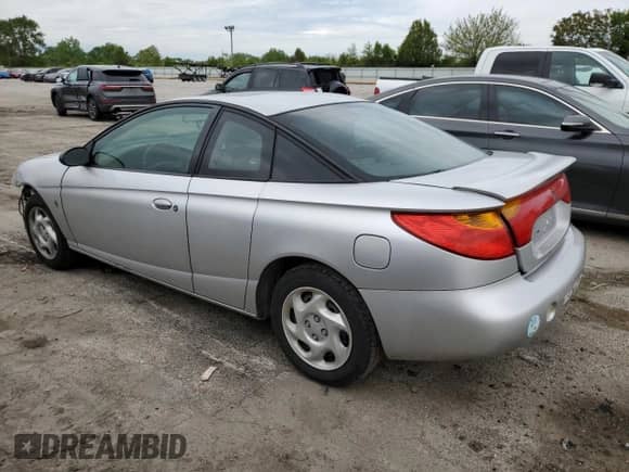 2002 Saturn SC with VIN 1G8ZR12702Z156044, listed as a Copart auction lot 57756395 with 157,708 mi miles and Salvage title. Bid and sale history available at DreamBid. Image 2.