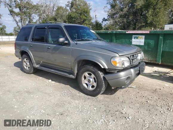 2000 Ford Explorer Limited with VIN 1FMDU75E9YUB50157, listed as a Copart auction lot 88743875 with 184,376 mi miles and Salvage title. Bid and sale history available at DreamBid. Image 4.