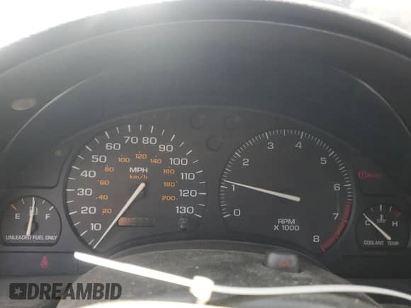 1999 Saturn SL z VIN 1G8ZK5274XZ200985, wystawiony jako Copart lot #61952535 z przebiegiem 145 391 mil mil oraz Szkoda całkowita • Salvage title. Historia ofert i sprzedaży dostępna na DreamBid. Obrazek 9.