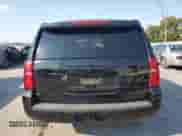 2015 Chevrolet Tahoe Commercial with VIN 1GNLC2EC9FR255678, listed as a Copart auction lot 80341485 with 128,393 mi miles and Salvage title. Bid and sale history available at DreamBid. Image 6.