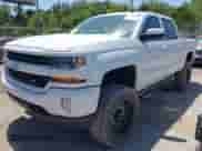 2018 Chevrolet Silverado 1500 LT with VIN 3GCUKRECXJG129377, listed as a IAAI auction lot 42856782 with 177,359 mi miles and . Bid and sale history available at DreamBid. Image 17.