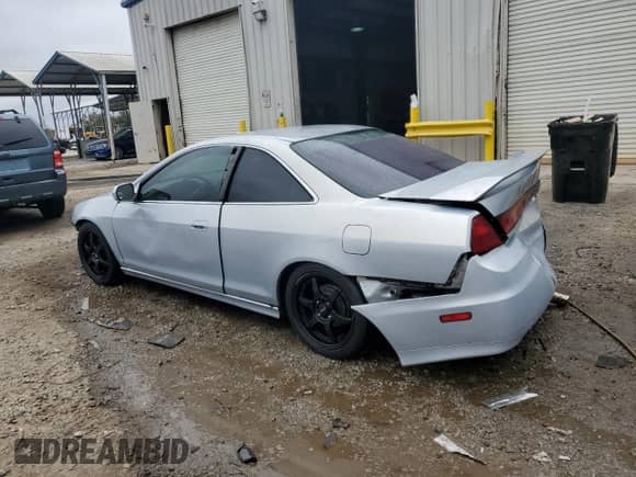 2001 Honda Accord z VIN 1HGCG32871A004296, wystawiony jako Copart lot #79751494 z przebiegiem 223 281 mil mil oraz Szkoda całkowita • Salvage title. Historia ofert i sprzedaży dostępna na DreamBid. Obrazek 2.