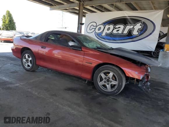 1997 Chevrolet Camaro Z28 z VIN 2G1FP22P5V2128745, wystawiony jako Copart lot #66188565 z przebiegiem Nie podano mil oraz Szkoda całkowita • Salvage title. Historia ofert i sprzedaży dostępna na DreamBid. Obrazek 4.