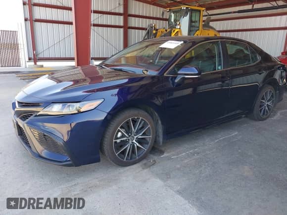 2022 Toyota Camry SE z VIN 4T1T11AK6NU700326, wystawiony jako IAAI lot #43065109 z przebiegiem 113 890 mil mil oraz . Historia ofert i sprzedaży dostępna na DreamBid. Obrazek 17.