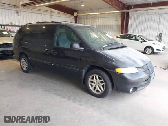 2000 Dodge Caravan SE with VIN 1B4GP44G0YB517076, listed as a IAAI auction lot 43134226 with 186,729 mi miles and . Bid and sale history available at DreamBid. Image 1.