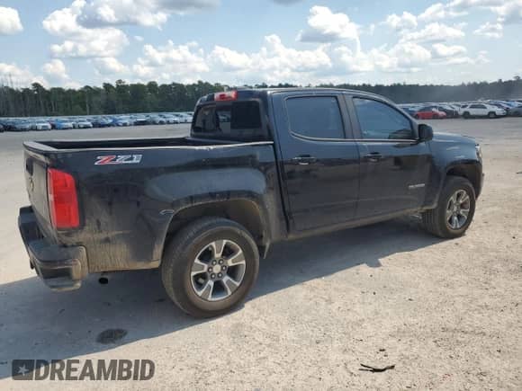 2018 Chevrolet Colorado 4WD Z71 с VIN 1GCGTDEN1J1270156, выставлен на аукционе Copart как лот 71476035 с пробегом 174 812 миль миль и Списание • Salvage title. История ставок и продаж доступна на DreamBid. Изображение 3.