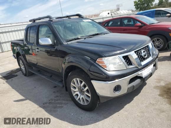 2012 Nissan Frontier SL with VIN 1N6AD0EV5CC439644, listed as a Copart auction lot 69870365 with 190,280 mi miles and Salvage title. Bid and sale history available at DreamBid. Image 4.