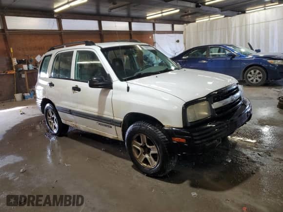 2003 Chevrolet Tracker with VIN 2CNBJ13C336950135, listed as a Copart auction lot 78845274 with 229,179 mi miles and Salvage title. Bid and sale history available at DreamBid. Image 4.