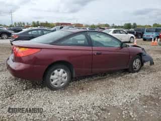 2002 Saturn SC с VIN 1G8ZP12892Z239888, выставлен на аукционе Copart как лот 72613284 с пробегом 130 138 миль миль и Списание • Salvage title. История ставок и продаж доступна на DreamBid. Изображение 3.