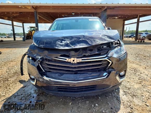 2018 Chevrolet Traverse LT Cloth с VIN 1GNERGKW3JJ126877, выставлен на аукционе Copart как лот 71099195 с пробегом 86 991 миль миль и Списание • Salvage title. История ставок и продаж доступна на DreamBid. Изображение 5.