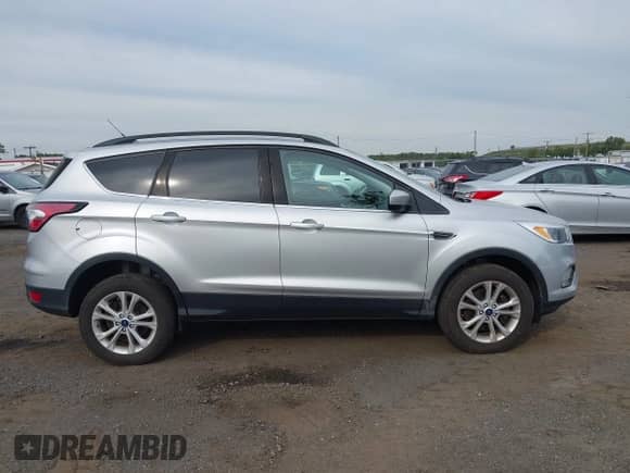 2018 Ford Escape SE с VIN 1FMCU9GD9JUA72822, выставлен на аукционе IAAI как лот 43317235 с пробегом 144 873 миль миль и . История ставок и продаж доступна на DreamBid. Изображение 13.