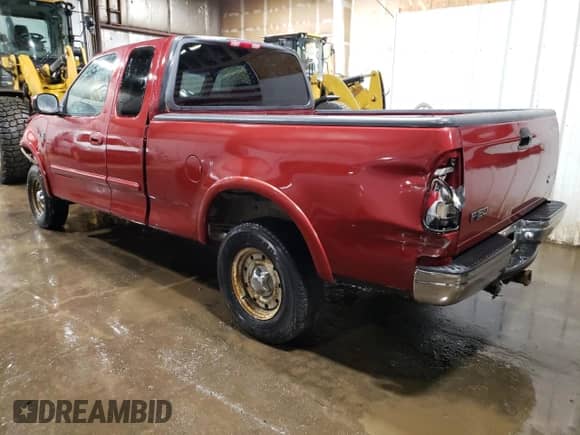 2000 Ford F-150 XL with VIN 1FTRX18W3YNB65850, listed as a Copart auction lot 52570145 with Not provided miles and Salvage title. Bid and sale history available at DreamBid. Image 2.