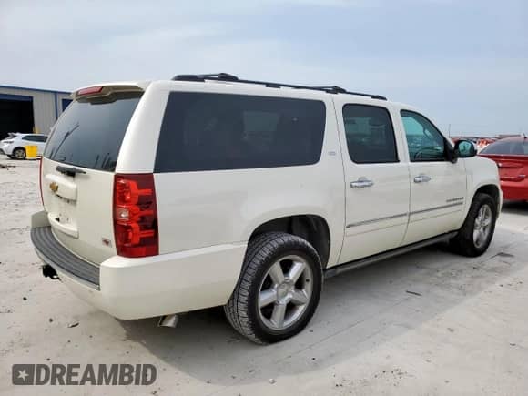 2014 Chevrolet Suburban LTZ with VIN 1GNSKKE79ER231994, listed as a Copart auction lot 71830095 with 152,865 mi miles and Clean title. Bid and sale history available at DreamBid. Image 3.