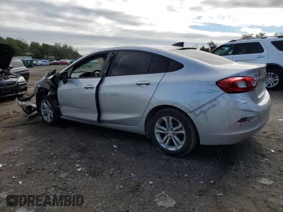 2019 Chevrolet Cruze LS с VIN 1G1BC5SM9K7151919, выставлен на аукционе Copart как лот 85908465 с пробегом 91 648 миль миль и Списание • Salvage title. История ставок и продаж доступна на DreamBid. Изображение 2.