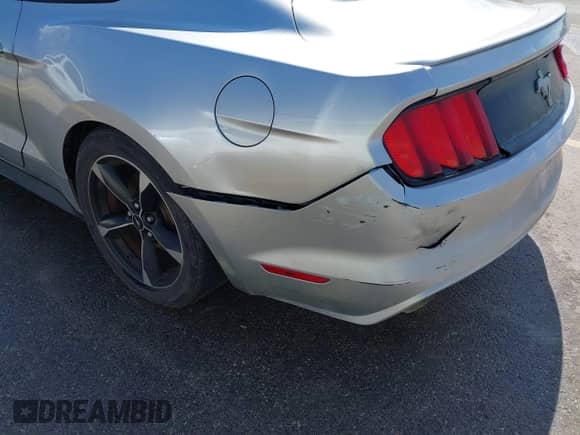 2015 Ford Mustang V6 with VIN 1FA6P8AM8F5301963, listed as a IAAI auction lot 43391100 with 179,630 mi miles and . Bid and sale history available at DreamBid. Image 6.