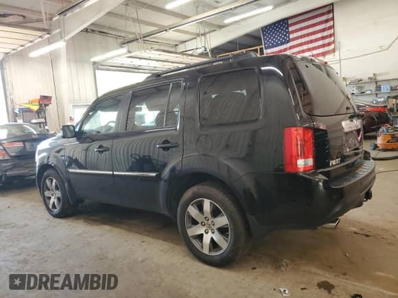 2014 Honda Pilot Touring with VIN 5FNYF4H93EB053490, listed as a Copart auction lot 82048495 with 144,096 mi miles and Salvage title. Bid and sale history available at DreamBid. Image 2.