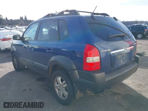 2007 Hyundai Tucson SE z VIN KM8JN72D77U674160, wystawiony jako IAAI lot #41581269 z przebiegiem 193 424 mil mil oraz . Historia ofert i sprzedaży dostępna na DreamBid. Obrazek 3.