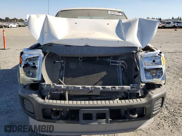 2011 Ford F-250 XL с VIN 1FT7W2B67BEA60180, выставлен на аукционе Copart как лот 70783175 с пробегом 74 400 миль миль и Списание • Salvage title. История ставок и продаж доступна на DreamBid. Изображение 11.