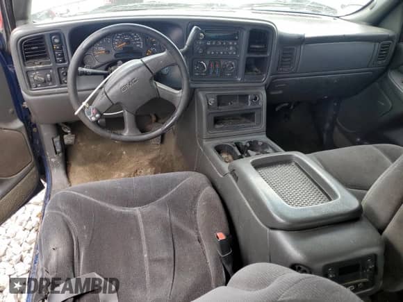 2004 GMC Sierra 1500 SLE z VIN 2GTEK13T941319242, wystawiony jako Copart lot #51701475 z przebiegiem Nie podano mil oraz Czysty tytuł • Clean title. Historia ofert i sprzedaży dostępna na DreamBid. Obrazek 8.