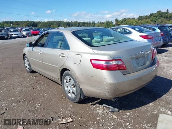 2007 Toyota Camry LE with VIN 4T1BK46KX7U019818, listed as a IAAI auction lot 43395039 with 210,676 mi miles and . Bid and sale history available at DreamBid. Image 3.
