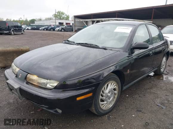 1999 Saturn SL z VIN 1G8ZK5272XZ263163, wystawiony jako IAAI lot #42180002 z przebiegiem 138 463 mil mil oraz . Historia ofert i sprzedaży dostępna na DreamBid. Obrazek 2.