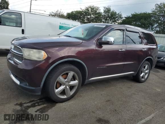 2012 Dodge Durango Citadel with VIN 1C4SDJET1CC188309, listed as a Copart auction lot 65580995 with 188,734 mi miles and Salvage title. Bid and sale history available at DreamBid. Image 1.