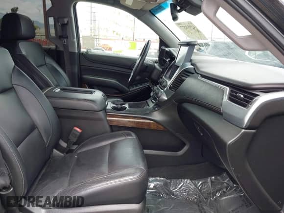 2017 Chevrolet Suburban LT with VIN 1GNSCHKC4HR151198, listed as a IAAI auction lot 42758277 with 92,359 mi miles and . Bid and sale history available at DreamBid. Image 5.