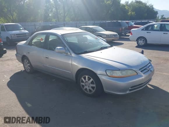 2002 Honda Accord SE z VIN 1HGCG668X2A059712, wystawiony jako IAAI lot #42904135 z przebiegiem Nie podano mil oraz . Historia ofert i sprzedaży dostępna na DreamBid. Obrazek 1.