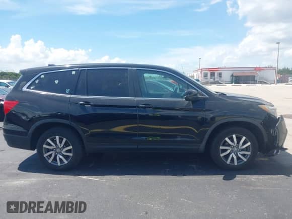 2019 Honda Pilot EX-L with VIN 5FNYF5H50KB018677, listed as a IAAI auction lot 42873434 with 64,717 mi miles and . Bid and sale history available at DreamBid. Image 13.