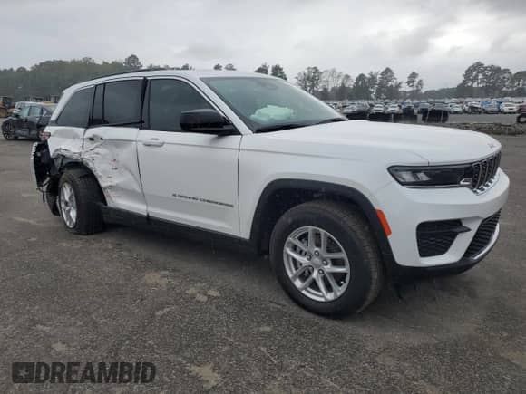 2025 Jeep Grand Cherokee Altitude with VIN 1C4RJHAG8SC273803, listed as a Copart auction lot 80373015 with 6,614 mi miles and Salvage title. Bid and sale history available at DreamBid. Image 4.