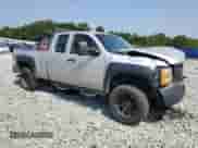 2011 Chevrolet Silverado 1500 Work Truck z VIN 1GCRKPE33BZ307173, wystawiony jako Copart lot #62484155 z przebiegiem 180 098 mil mil oraz Szkoda całkowita • Salvage title. Historia ofert i sprzedaży dostępna na DreamBid. Obrazek 4.