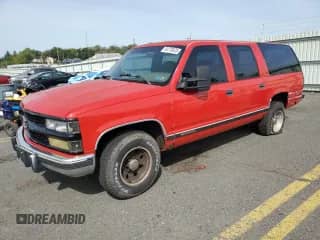 1994 Chevrolet Suburban с VIN 1GNGC26N5RJ413549, выставлен на аукционе Copart как лот 84770025 с пробегом 214 281 миль миль и Списание • Salvage title. История ставок и продаж доступна на DreamBid. Изображение 1.