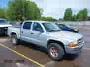2001 Dodge Dakota with VIN 1B7GG2AX51S167476, listed as a IAAI auction lot 42487594 with 234,228 mi miles and . Bid and sale history available at DreamBid. Image 1.