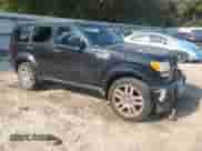 2011 Dodge Nitro Heat with VIN 1D4PT4GX7BW500594, listed as a Copart auction lot 80340385 with 216,634 mi miles and Salvage title. Bid and sale history available at DreamBid. Image 4.