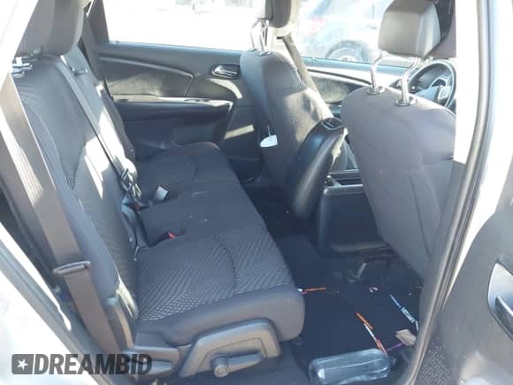 2013 Dodge Journey American Value z VIN 3C4PDCAB5DT508705, wystawiony jako IAAI lot #43432970 z przebiegiem 215 448 mil mil oraz . Historia ofert i sprzedaży dostępna na DreamBid. Obrazek 8.