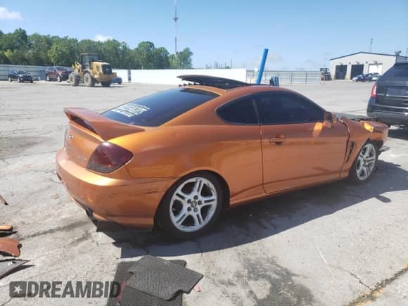 2006 Hyundai Tiburon GT with VIN KMHHN65F66U191134, listed as a Copart auction lot 56692615 with 197,093 mi miles and Salvage title. Bid and sale history available at DreamBid. Image 3.