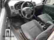 2002 Nissan Frontier XE with VIN 1N6DD26S42C319636, listed as a Copart auction lot 86513805 with 172,562 mi miles and Salvage title. Bid and sale history available at DreamBid. Image 8.