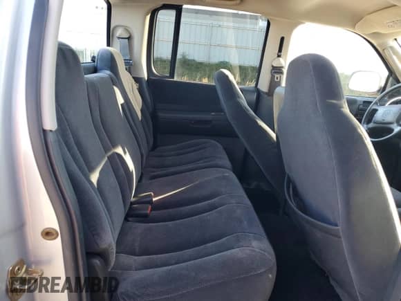 2002 Dodge Dakota SLT z VIN 1B7HG48N02S564941, wystawiony jako Copart lot #85174375 z przebiegiem 110 566 mil mil oraz Czysty tytuł • Clean title. Historia ofert i sprzedaży dostępna na DreamBid. Obrazek 10.