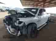 2020 Ram 1500 SLT z VIN 1C6RR6TT0LS133332, wystawiony jako IAAI lot #41923140 z przebiegiem 83 541 mil mil oraz . Historia ofert i sprzedaży dostępna na DreamBid. Obrazek 18.