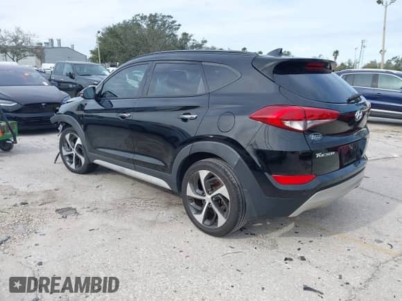 2018 Hyundai Tucson Value z VIN KM8J33A27JU619066, wystawiony jako IAAI lot #41351283 z przebiegiem 89 805 mil mil oraz . Historia ofert i sprzedaży dostępna na DreamBid. Obrazek 3.