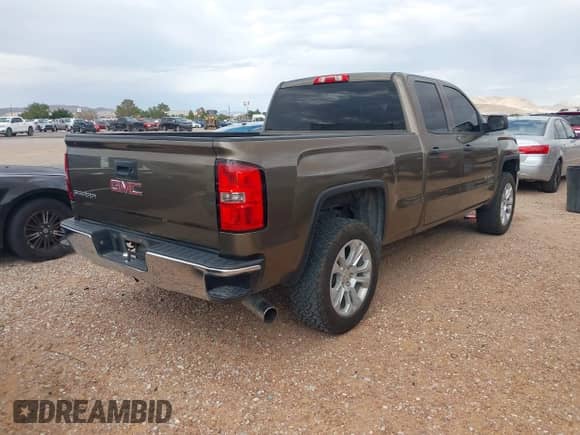 2015 GMC Sierra 1500 with VIN 1GTR1TEH8FZ171779, listed as a IAAI auction lot 42580891 with 189,935 mi miles and . Bid and sale history available at DreamBid. Image 4.