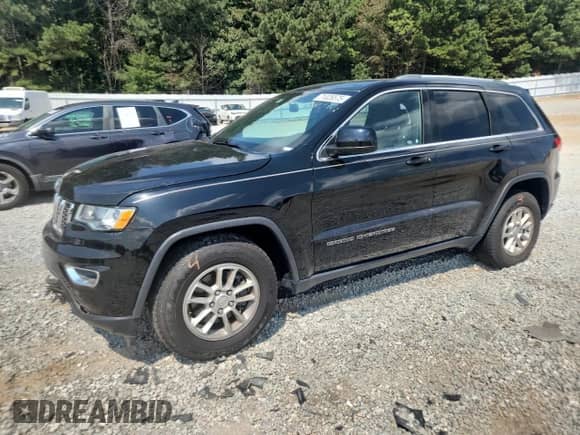 2018 Jeep Grand Cherokee Laredo E with VIN 1C4RJEAG6JC339522, listed as a Copart auction lot 71026575 with 87,235 mi miles and Salvage title. Bid and sale history available at DreamBid. Image 1.