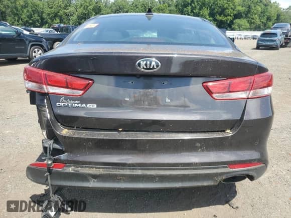2018 Kia Optima LX z VIN KNAGT4L39J5236523, wystawiony jako Copart lot #68594335 z przebiegiem 66 207 mil mil oraz Szkoda całkowita • Salvage title. Historia ofert i sprzedaży dostępna na DreamBid. Obrazek 6.
