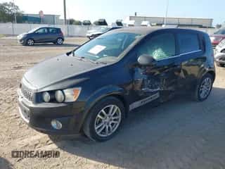 2014 Chevrolet Sonic LT with VIN 1G1JD6SH8E4224107, listed as a IAAI auction lot 43370286 with 163,665 mi miles and . Bid and sale history available at DreamBid. Image 2.