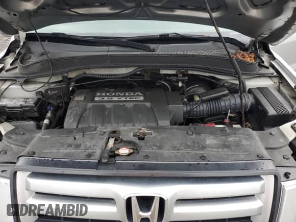 2006 Honda Pilot EX-L with VIN 2HKYF18706H543174, listed as a Copart auction lot 83982065 with 197,216 mi miles and Salvage title. Bid and sale history available at DreamBid. Image 12.